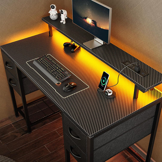 47-Inch Carbon Fibre Black Computer Desk with 4 Drawers, LED Lighting, and Power Outlets - Ideal for Home Office and Gaming with Ample Storage Space