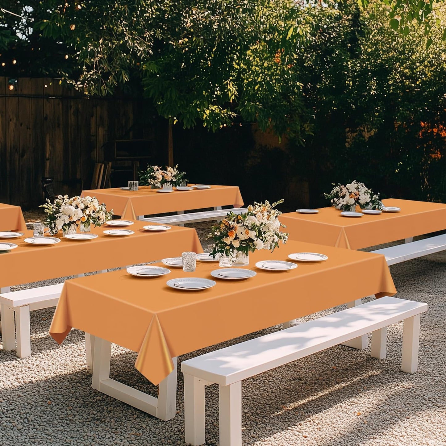 Set of 4 Orange Rectangular Tablecloths, 54x72 Inches, Waterproof and Spillproof Disposable Plastic Covers for Dining, Buffets, Picnics, and Outdoor Events