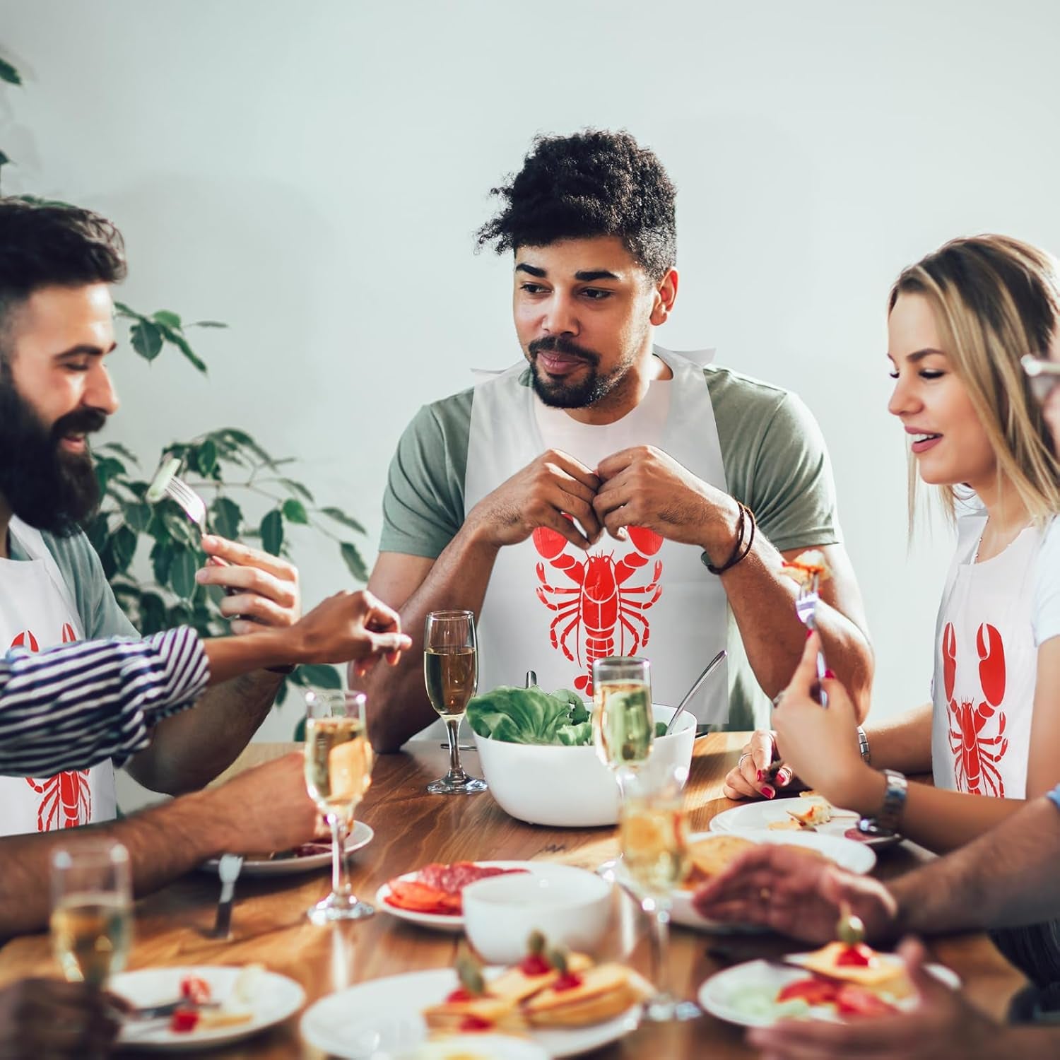 200-Count Disposable Crawfish Bibs and Party Supplies Set: Includes 50 Lobster Bibs, 50 Moist Towelettes, and 100 Pairs of Plastic Gloves for Seafood Festivities
