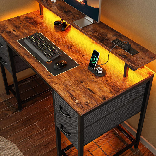 47-Inch Computer Desk with Four Drawers, LED Lighting, and Power Outlets - Spacious Home Office and Gaming Desk in Rustic Brown and Black