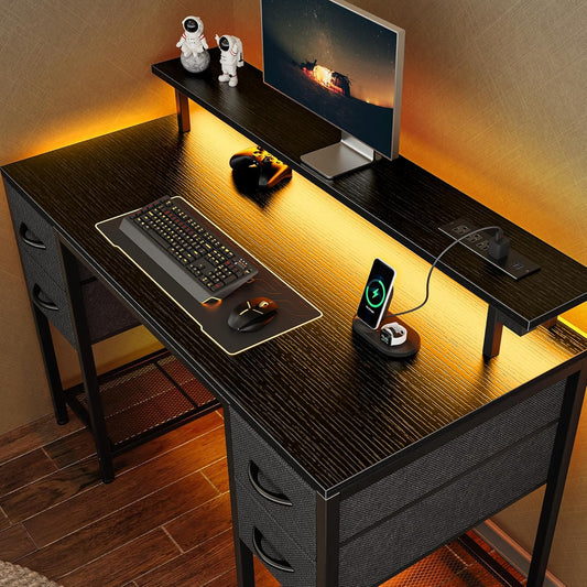 47-Inch Computer Desk with 4 Drawers, LED Lighting, and Power Outlets - Spacious Home Office and Gaming Desk in Black