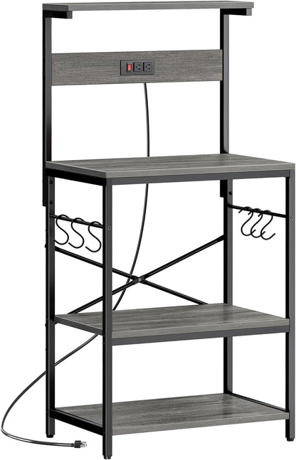 Professional Kitchen Bakers Rack with Power Outlet, 4-Tier Coffee Bar Table, Microwave Stand with 6 S-Shaped Hooks, Storage Shelf for Spices, Pots, and Pans - Charcoal Gray