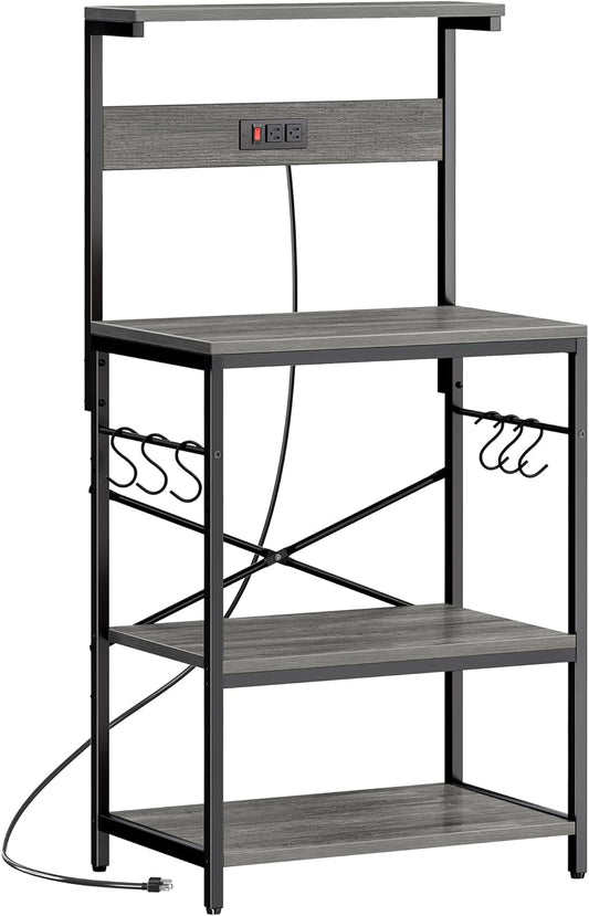 Professional Kitchen Bakers Rack with Power Outlet, 4-Tier Coffee Bar Table, Microwave Stand with 6 S-Shaped Hooks, Storage Shelf for Spices, Pots, and Pans - Charcoal Gray