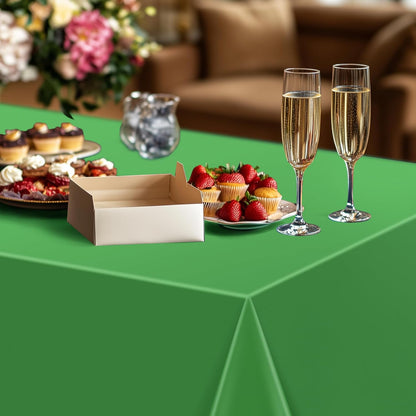Set of 4 Dark Green Rectangle Tablecloths, 54x72" Solid Color Waterproof and Spillproof Disposable Plastic Covers, Durable Table Linens for Dining, Buffets, Picnics, and Outdoor Events