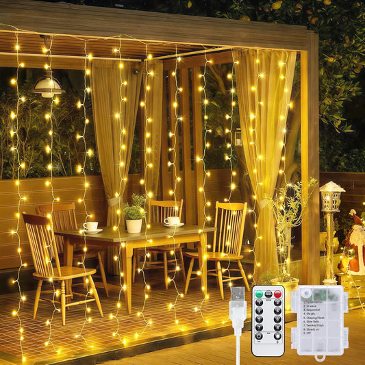 200 LED Curtain Lights Battery Operated & USB Plug In, 8 Modes Hanging String Lights Indoor with Remote, Warm White Twinkle Curtain Lights for Bedroom Backdrop Classroom Wedding Party Decor